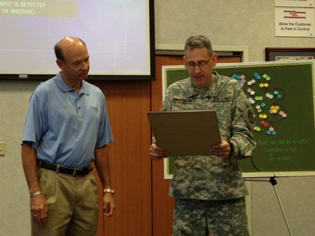 Commander George Appenzeller reads a certificate of appreciation | Jenkins and Wynne Honda in Clarksville TN