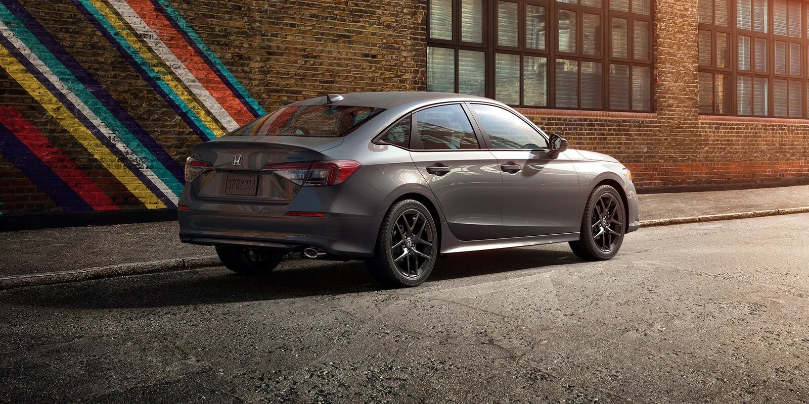 2026 Honda Civic Sport, Meteorite Gray, rear three-quarter