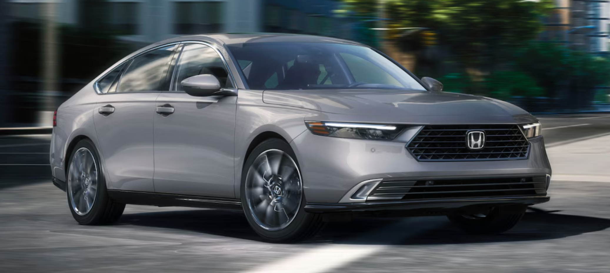 silver 2025 Honda Accord driving on the street